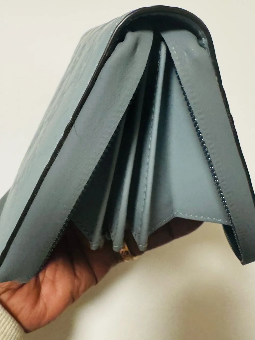 Gucci Light Blue Embossed GG Zip-Around Wallet